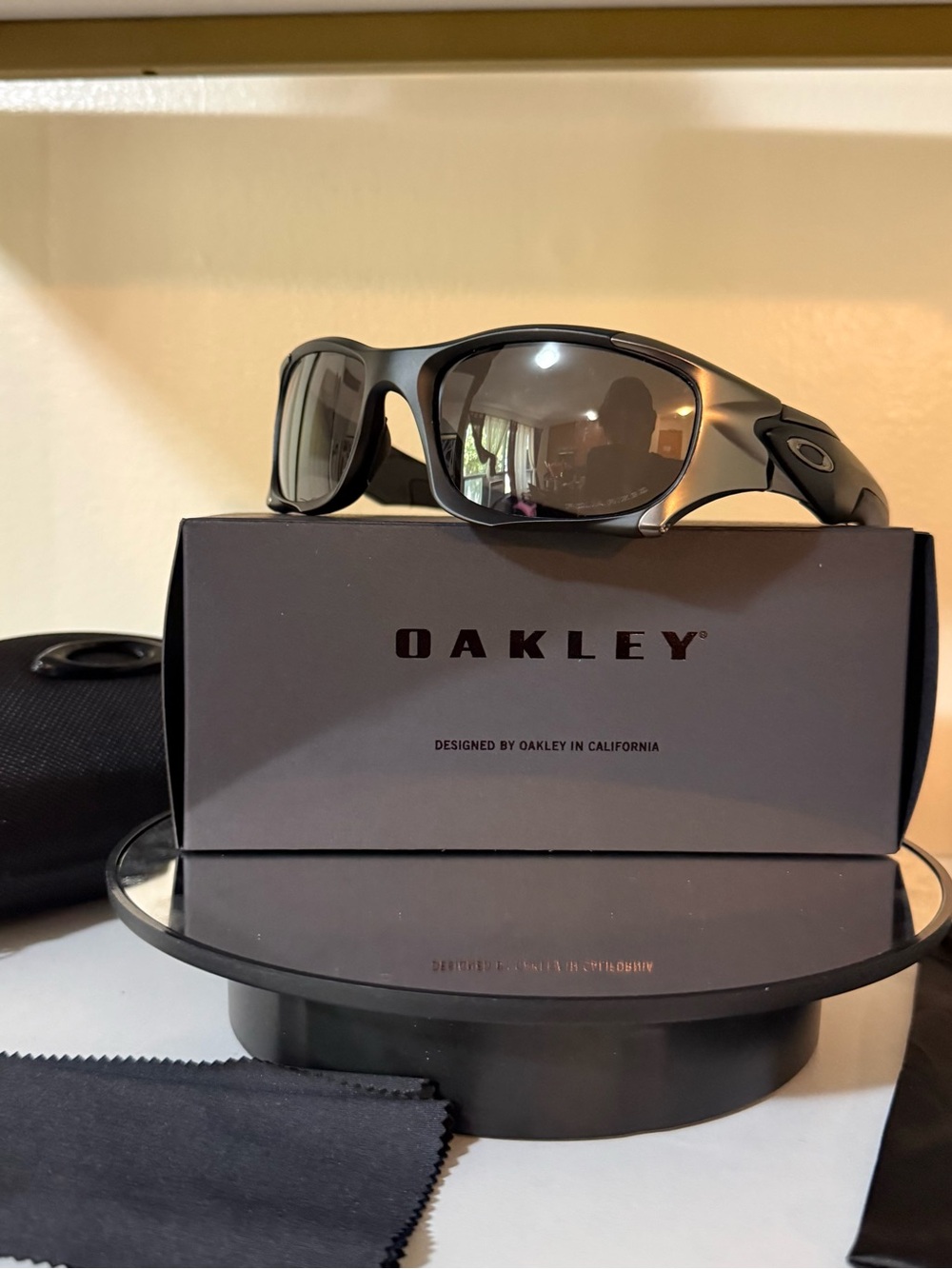 Oakley Matte Gunmetal Frame Sunglasses with Gray Lenses